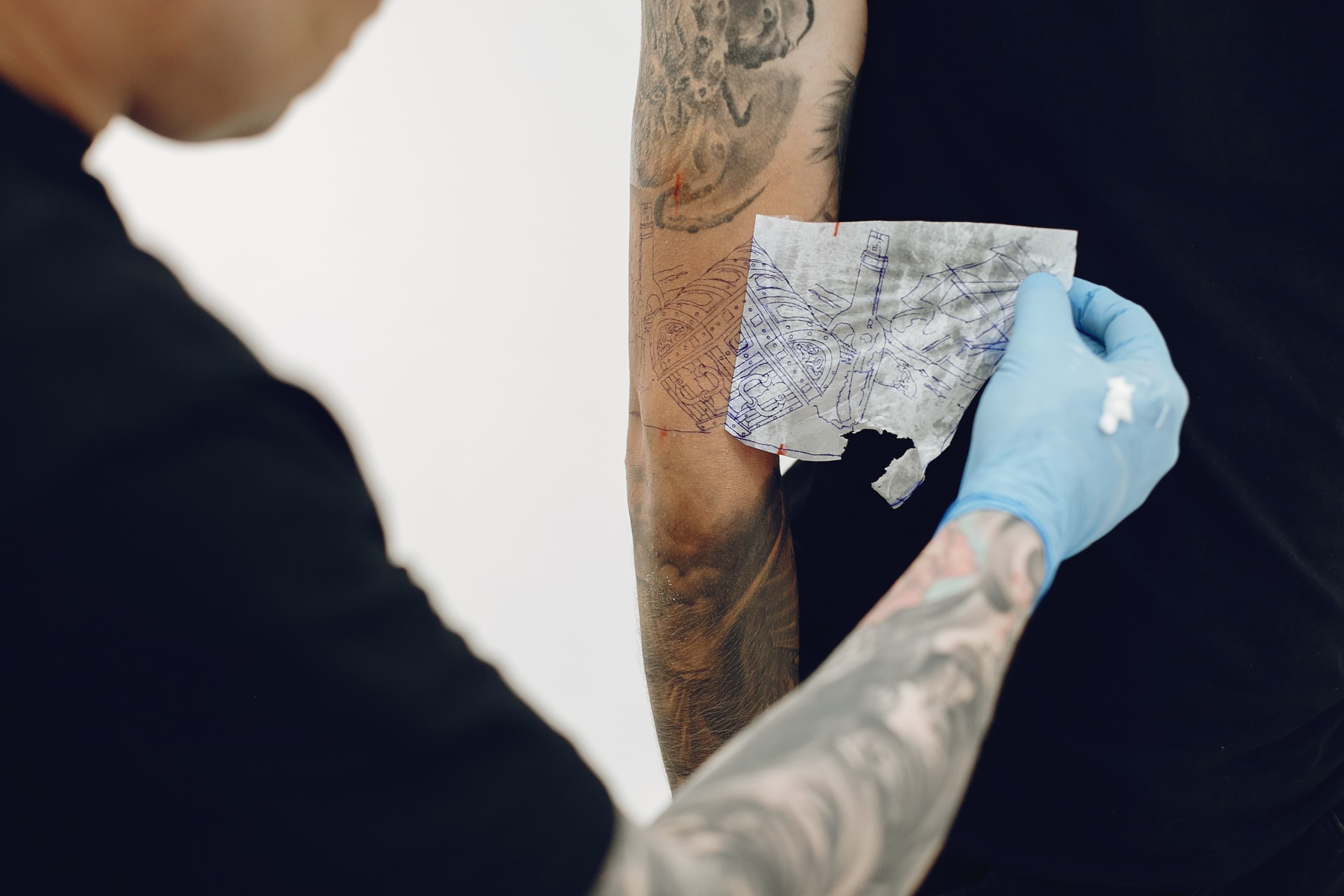 Tattoo fading progress for cover-up preparation after laser sessions
